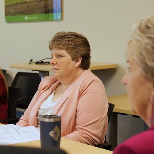 female board members at conference table