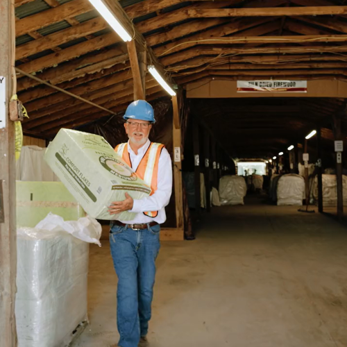 Tom Johnson, CEO carrying product